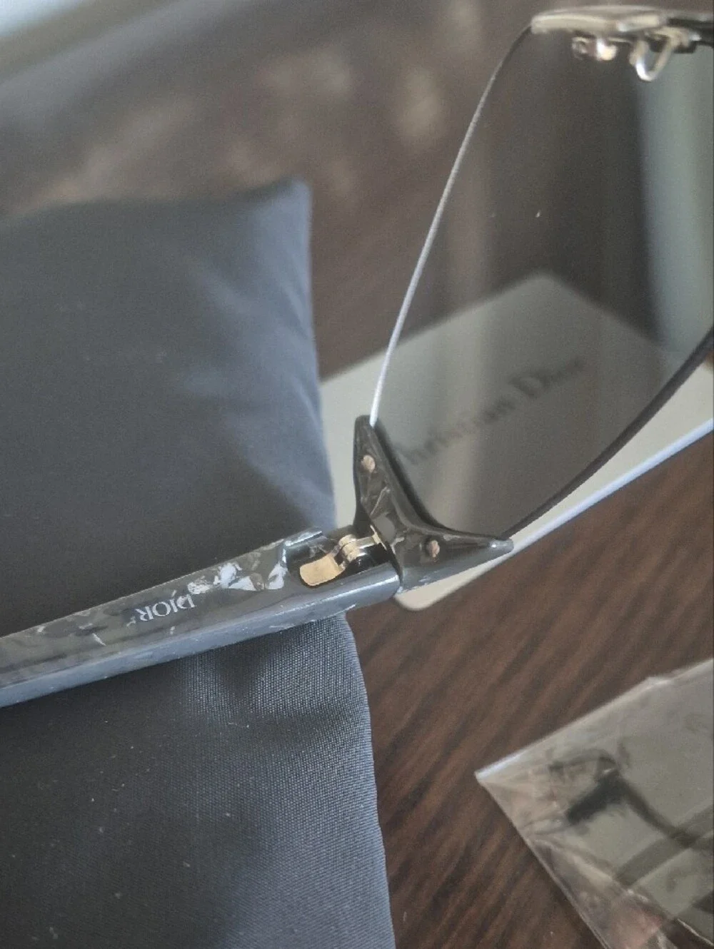 Dior Rimless Shield Sunglasses in Black Smoke
